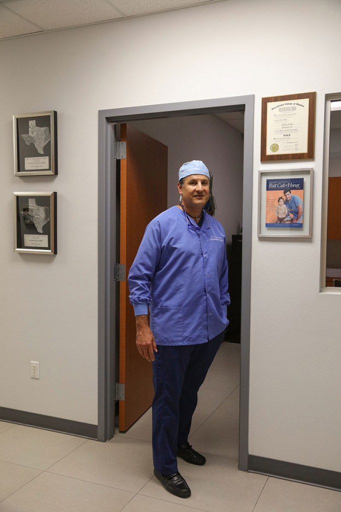 Dr. Carlos Cruz standing in hallway